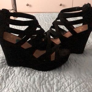 REPORT black wedged heels.